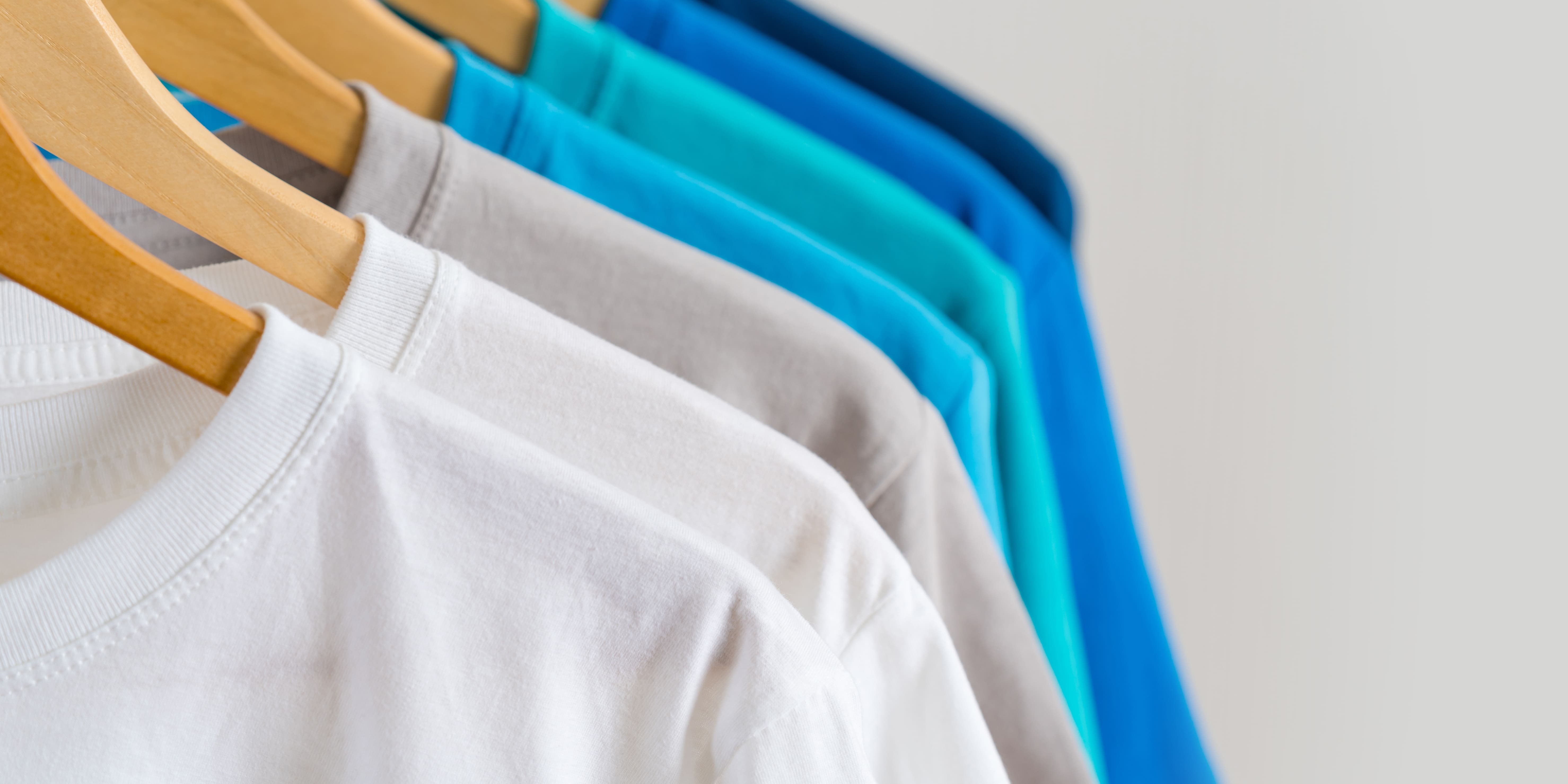 close-up-of-colorful-t-shirts-on-hangers-apparel-2024-12-03-21-23-07-utc 拷貝