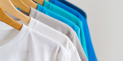close-up-of-colorful-t-shirts-on-hangers-apparel-2024-12-03-21-23-07-utc 拷貝
